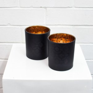 black and gold candle holder