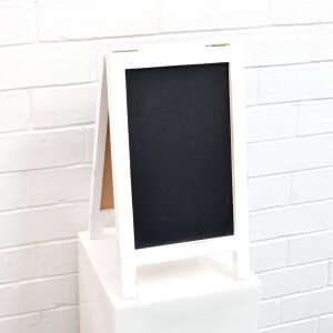 white frame chalkboard