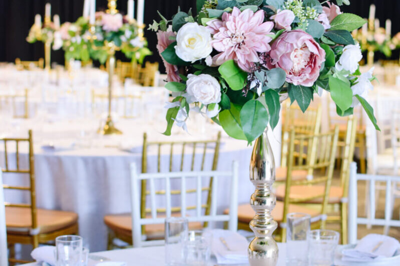 Gold Candlestick centrepiece with Florals